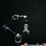 A robotic arm strategically playing chess, symbolizing AI innovation.